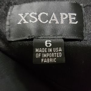 Xscape black mini dress size 6. Like new condition
